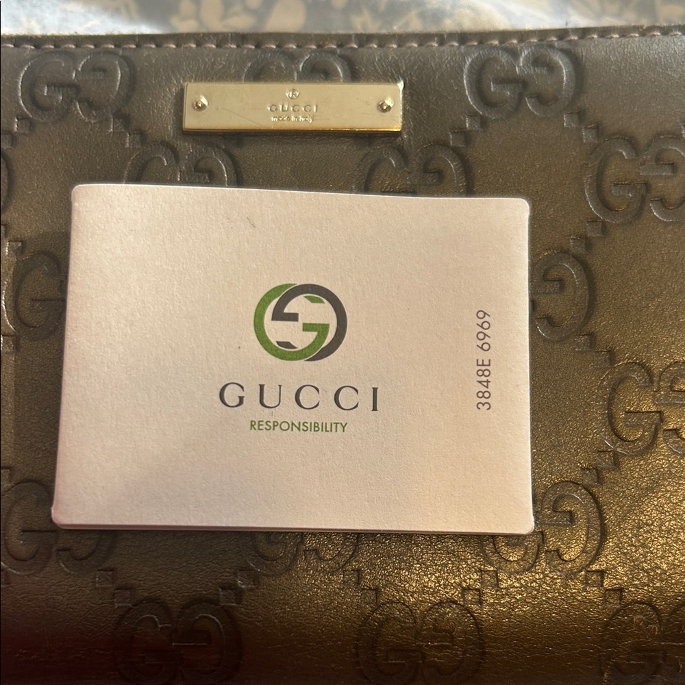 Gucci goldish brown  Monogram Leather Wallet